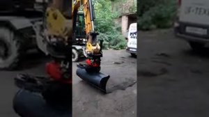 Колесный экскаватор SANY SY65W с тилротатором