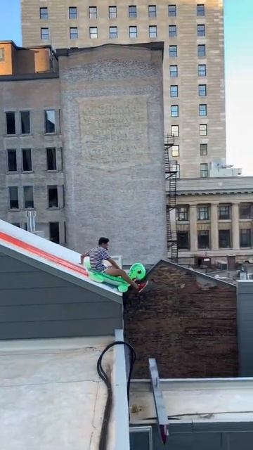 SlidingDown a roof on a slip and slide with an inflatable pool toy and hitting a jump, PT.2 смотреть онлайн