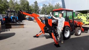 Экскаватор на мини трактор МТЗ 320 ЭТМ 320