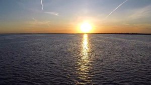 aerial sailboat at sunset (1080p)