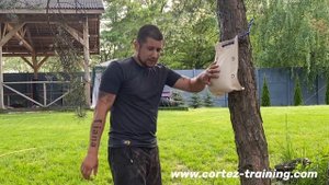 Постановка удара рукой при помощи мешка для Вин Чунь