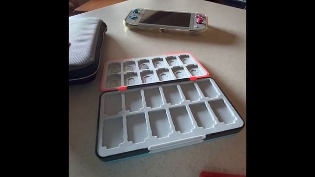 unboxing and reviewing 48 game carrying case for switch