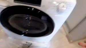 Полная распаковка новой стирально-сушильной машины Candy SmartPro inverter CSOW43646TWMB-07.