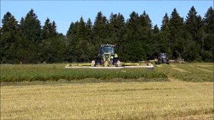 CLAAS AXION 850 с косилками CLAAS DISCO 1100/3600