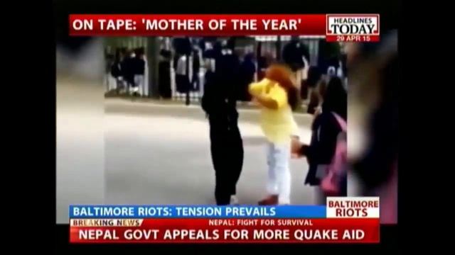 Caught On Camera: Mom Beats Rioting Son In Baltimore смотреть онлайн