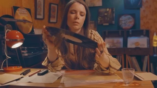 Late Night at the Record Shop   **** Unintelligible Whispers (examining vinyl records, rain, 1970s)