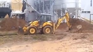 backhoe loader NEW HOLLAND B115B(экскаватор -погрузчик NEW HOLLAND B115B)