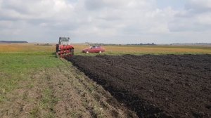 Трактор Т-150 с оборотным плугом Agromasz