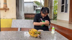 Baby monkey Abi likes to eat bananas