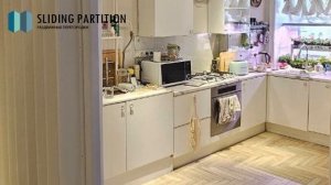 Белая мягкая перегородка для отделения кухни в квартире-студии