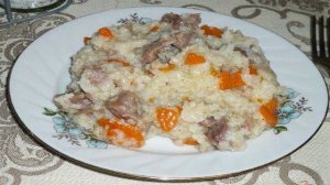 Рисовая каша с куриными желудками