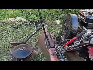 Усовершенствование натяжителя ремня на роторной косе Заря.