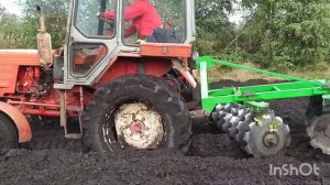 Т-25 і дискова борона Бомет 1,5м. Придисковуємо тритикале.