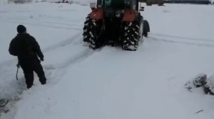 Буксировка МТЗ 82 трактором МТЗ 2022 из сугроба