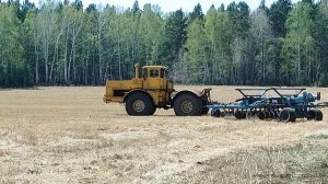 купили к700а, пробуем дисковать поле под рапс