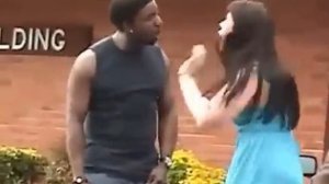 Негр избивает девушку!