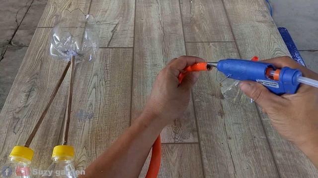 Handcrafted recycled plastic bottles into a flower pot shaped like a stork смотреть онлайн