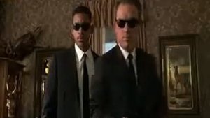 Люди в черном (1997) Разговор с женой Эдгара.       Men in black.