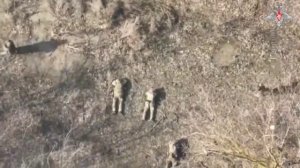 Кадры боевой работы и водружения российского флага в ходе освобождения населенного пункта Каменка в