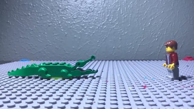 Lego man bullies an alligator