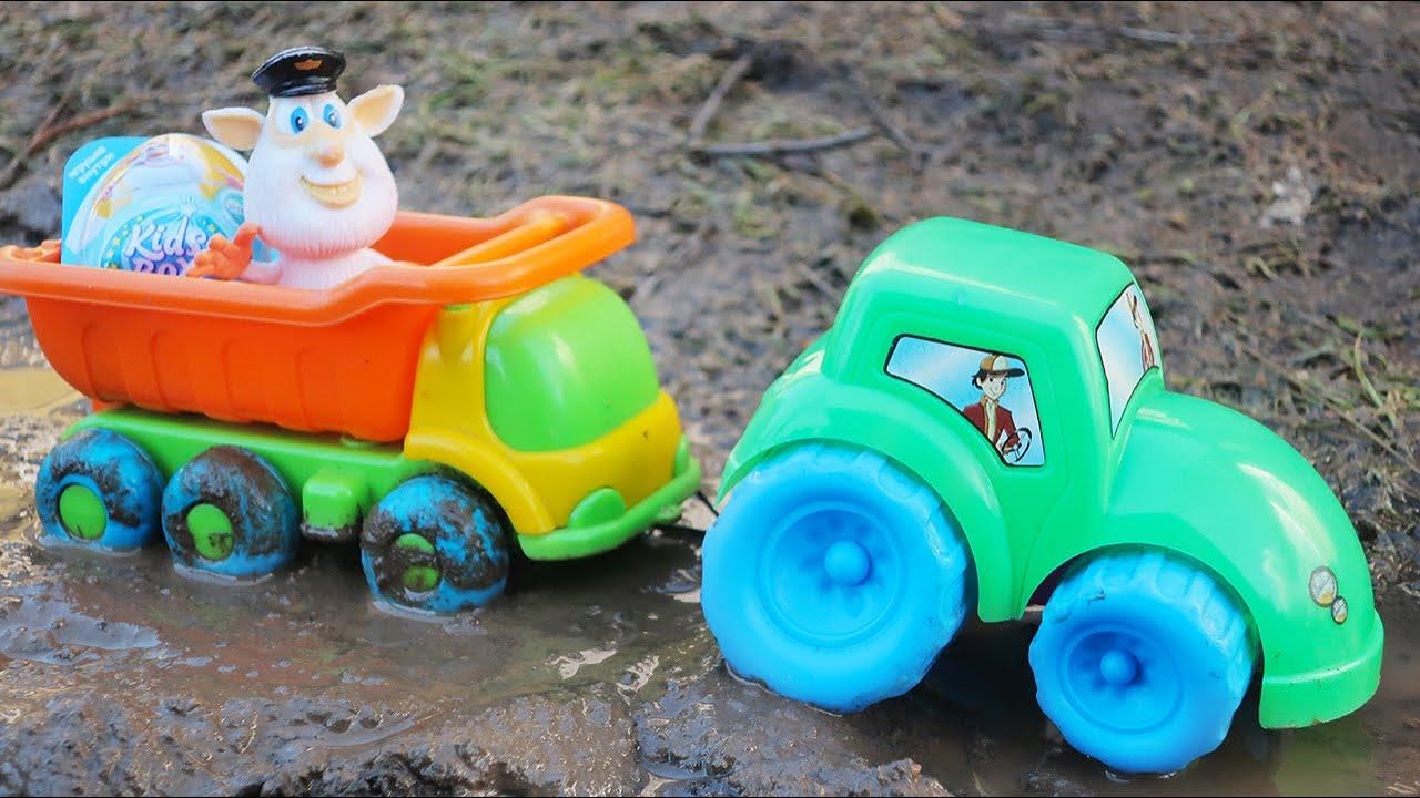 Мультик с игрушками. Трактор и самосвал. Буба открываем сюрприз смотреть онлайн