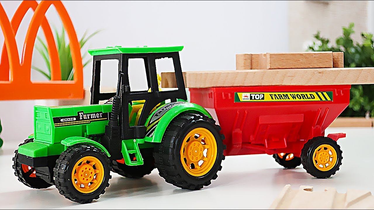 Грузовые машины и трактора строят деревянную железную дорогу смотреть онлайн