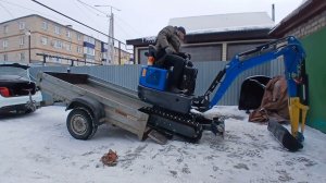 заезд экскаватора на прицеп и правильная его развесовка и расположение
