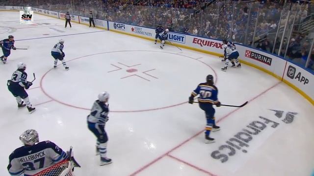 Blues' Tyler Tucker Leaves Jets' Connor Hellebuyck Stunned With A Blast From The Point