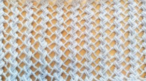 Ажурный узор спицами.