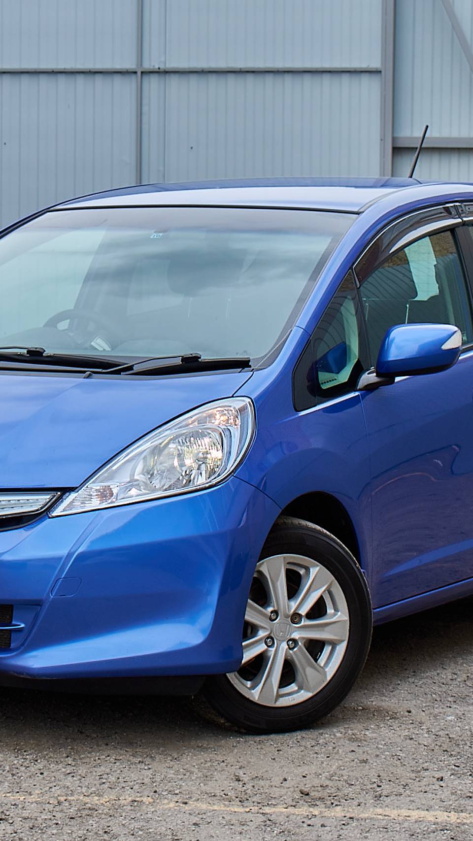Обзор на Honda Fit Хетчбэк 5 дв. Hybrid 1.3h CVT 2010г