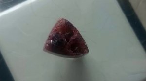 Турмалин:  кабошон  с кристаллами на верхней поверхности