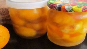 Персики консервированные  половинками