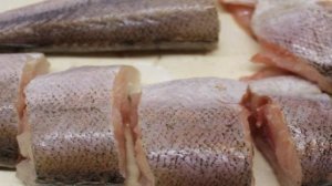 Хек с луком и морковкой в духовке