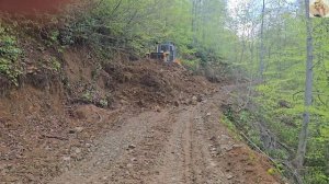 Строительство, срезаем горный склон