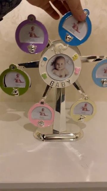 014012 (1-4) Фоторамка -карусель, детская с музыкой на 7 фот? смотреть онлайн