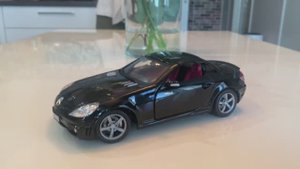 Обзор модели Mercedes-Benz SLK 55 AMG в масштабе 1:18 от Motormax