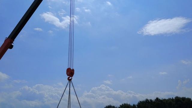 Выгрузка манипулятором кирпича строительного полнот?