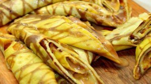 Шоколадно - ванильные блины с вареной сгущенкой и грецкими орехами