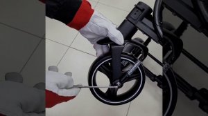 Крепление колеса коляски