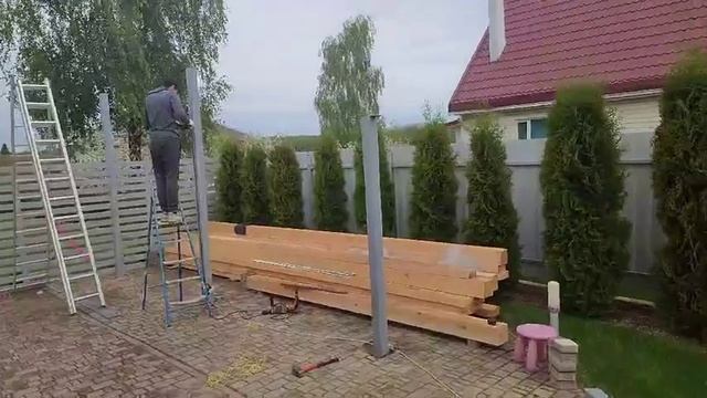 Монтаж навеса для машины.