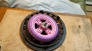 "Крутая" самоделка из колеса от  детского велосипеда и колпака от автомобиля