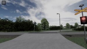 Пассажирский вагон проезжает железнодорожный переезд