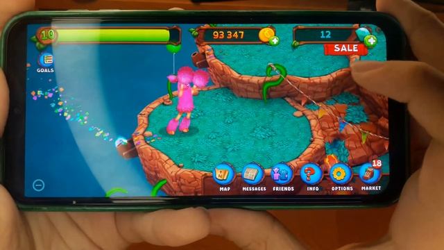 Играю в игру My singing monsters: dawn of fire. Телепортнул одного монстра на праздничный остров.