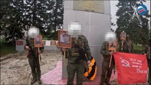 На передовой с памятью: бойцы ВС РФ провели 
акцию «Бессмертный полк»