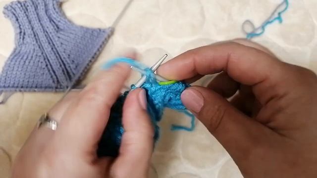 регланная линия из резинки два на два спицами.