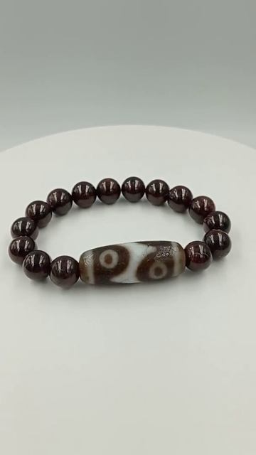 6 Глаз - Зуб тигра бусина Дзи (браслет гранат) смотреть онлайн