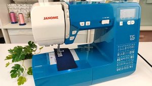 Janome TS1115.  Кнопка реверс