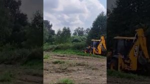 Выравнивание, планировка участка экскаватором-погруз