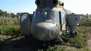 Вертолет МИ-2 с оборудованием для авиахимработ.