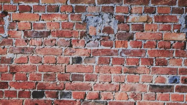 Бумажная наклейка. Фон кирпичный и наклека в виде кирпичного фона